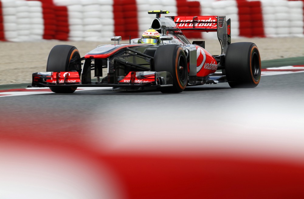 „McLaren“: neliepėme S. Perezui nelenkti J. Buttono