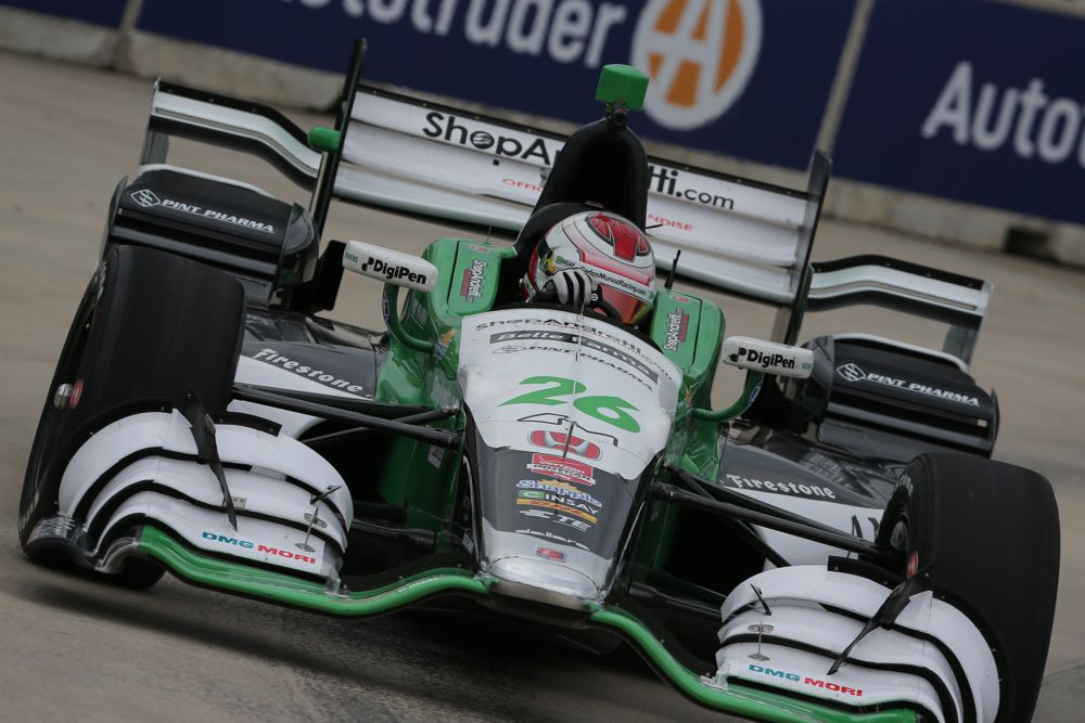 IndyCar. Sutrumpintose lenktynėse Detroite nugalėjo C. Munozas