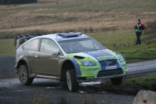 <span style="background:#000000; color:white; padding: 0 2px">WRC</span> M.Gronholmas Velse artėja prie pergalės